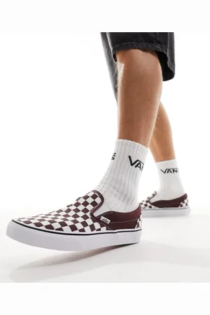 Vans Slip on checkerboard sneakers in white and