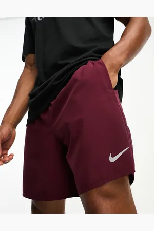 Nike Challenger Dri-FIT 2-in-1 7 inch shorts in marroon