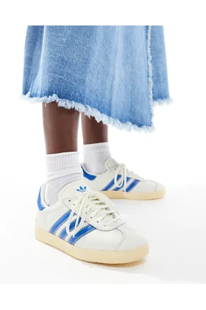adidas Gazelle trainers in white and blue