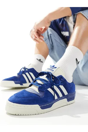 adidas Rivalry Low trainers in retro and off white