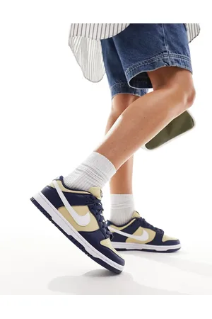 Nike Dunk low NN womens trainers in midnight and gold