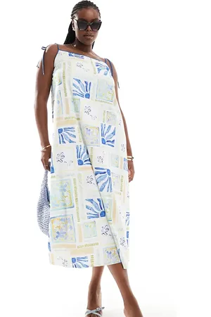 ASOS ASOS DESIGN Curve strappy trapeze maxi dress with contrast straps in summer tile print