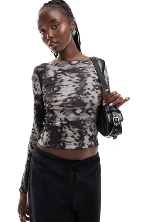 Weekday Fair long sleeve boat neck top with reversed seams in animal print