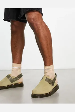 Dr. Martens Jorge II mules in pale olive suede