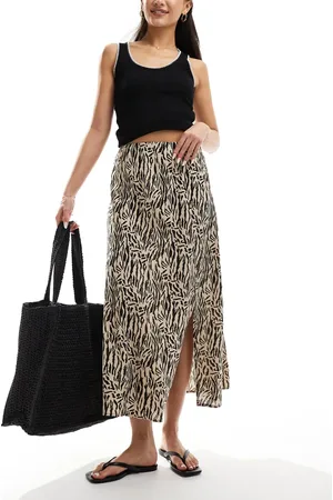 Pieces® Side slit midi skirt in beige animal print
