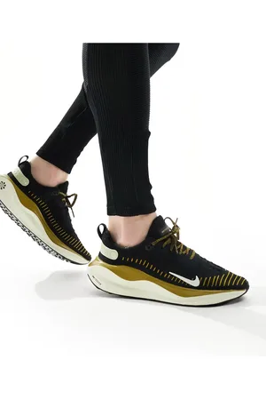 Nike React infinity Run Flyknit 4 trainers in and gold