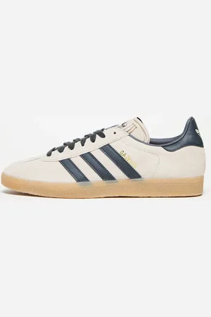 adidas Gazelle trainers in taupe and indigo