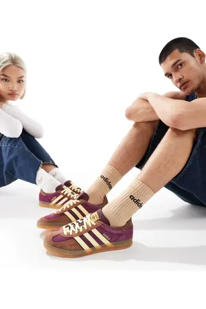 adidas Gazelle Indoor trainers in maroon and yellow with gum sole