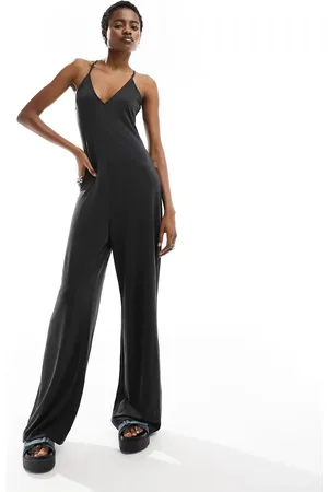Monki Jersey jumpsuit in with cross back straps in