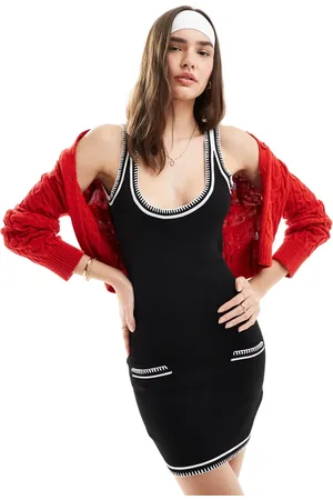 SNDYS Knit scoop back detail mini dress with pocket detail in with white stitch