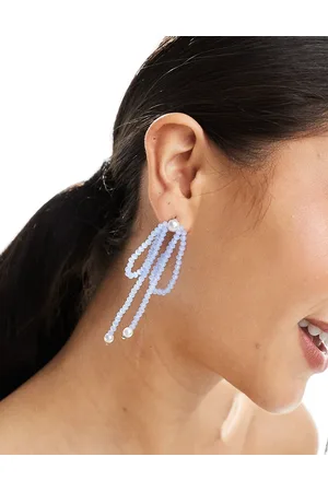 True Decadence Statement beaded bow earrings in pale