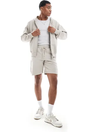 The Couture Club Co-ord raw seam jersey shorts in beige