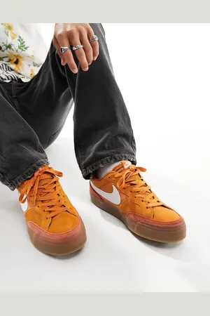 Nike Zoom Pogo Plus trainers in orange