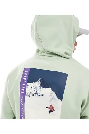 The North Face Snowboard retro back graphic hoodie in sage Exclusive at ASOS