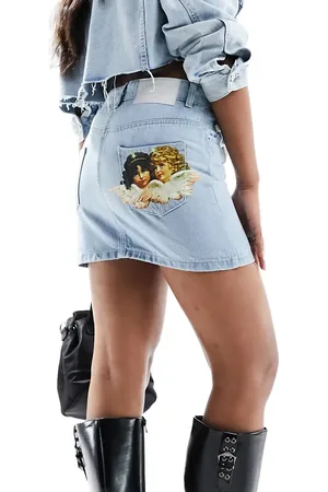 Fiorucci Micro mini denim skirt in vintage wash with angel patch bum
