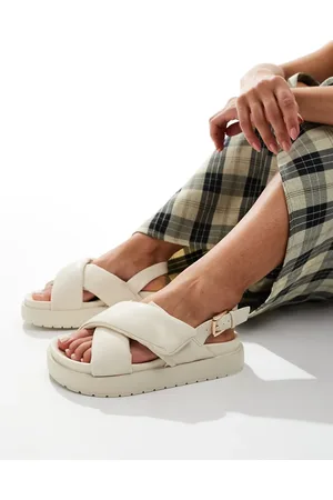 Truffle Collection Padded cross strap sandals in beige