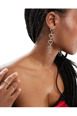 True Decadence Crystal heart statement earrings in silver