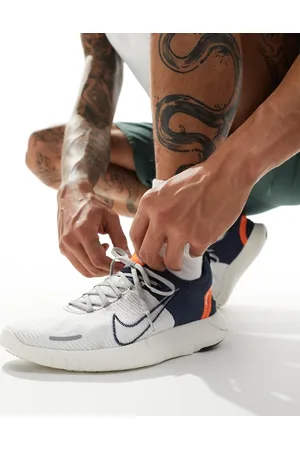 Nike Free Run Flyknit NN trainers in and orange