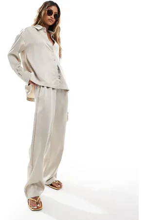 The Couture Club Co-ord satin trousers in beige