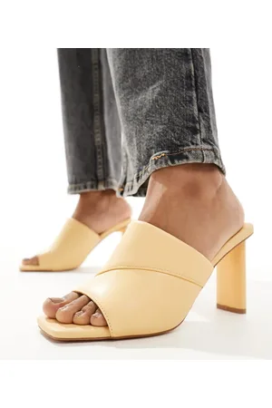 London Rebel Heeled mules in lemon