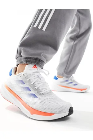 adidas Adidas Running Supernova Stride trainers in and blue