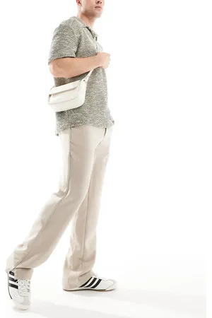 The Couture Club Trousers with split hem in beige