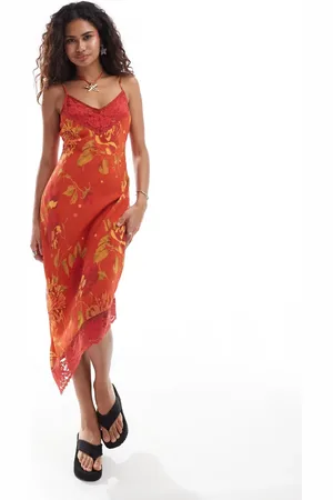 Reclaimed Asymmetric hem midi cami slip dress in orange floral print