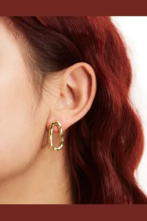 LOST SOULS Stainless steel wavy stud earrings in 18k plated
