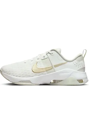 Nike Zoom Bella 6 premium trainers in and gold