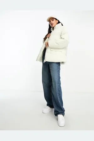 The Couture Club Oversized pleated puffer jacket in beige with tie waist detail