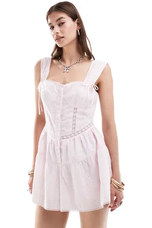 Reclaimed Washed western broderie button front playsuit with bows