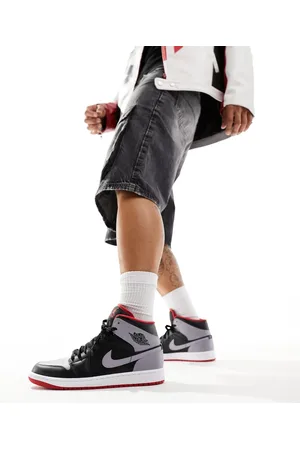 Jordan Air 1 Mid trainers in and grey