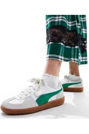 PUMA Palermo Leather trainers in with green detail