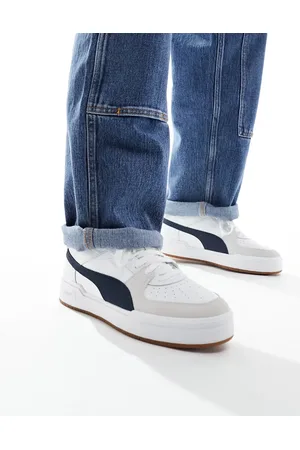 PUMA CA Pro trainers in and navy with gum sole
