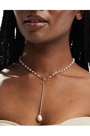 True Decadence Pearl bow lariat necklace in