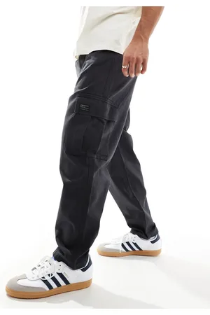 ASOS Oversized tapered cargo trousers with patch in charcoal
