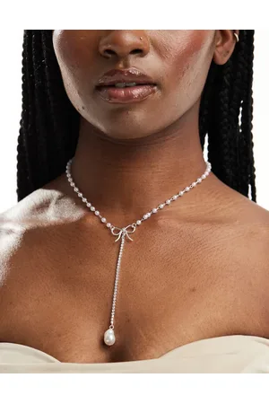 True Decadence Pearl bow lariat necklace in