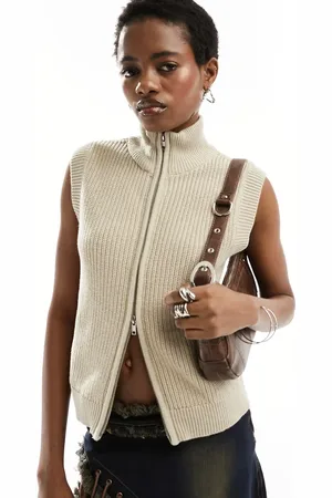 Monki Fitted knitted vest top with front zip in two tone beige