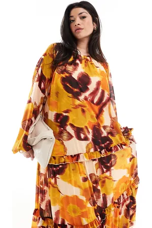 ASOS ASOS DESIGN Curve high neck smock maxi dress with frill detail in blurred floral print