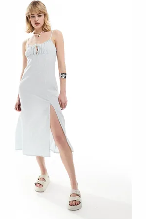 Monki Strappy midi dress with split in blue ditsy print