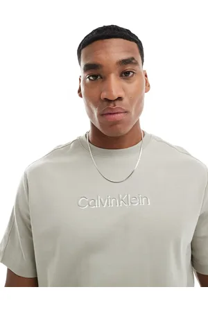 Calvin Klein Shadow embossed logo t-shirt in beige