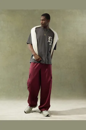 ASOS Loose cargo trousers with elasticated waist in burgundy