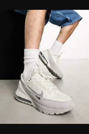 Nike Air Max Pulse trainers in beige