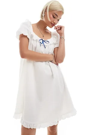 Neon Rose Bow detail puff sleeve mini smock dress in