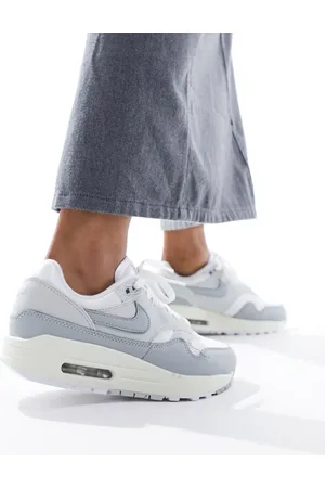 Nike Air Max 1 trainers in white and