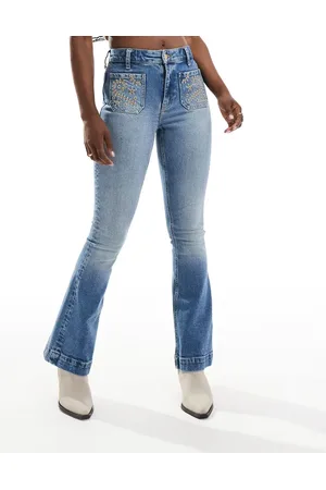 River Island Flare jean with embroidered pockets in midwash
