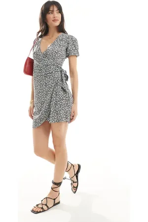 Pimkie Wrap tie side mini dress in black floral