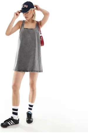 Monki Mini denim dungaree dress in dark wash