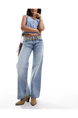 Monki Imoo low waisted wide fit jeans in tinted dirty wash