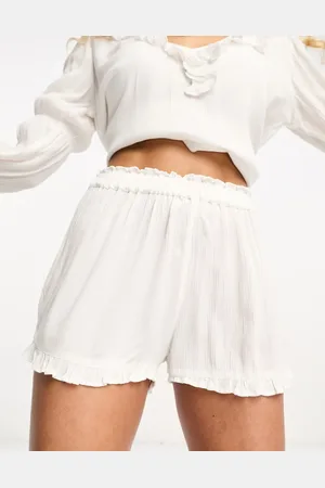 Iisla & Bird Ruffle beach short co-ord in